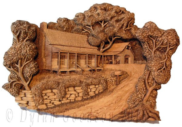 sepia toned pictorial relief carving of the classic american farmhouse with a barn in the background
