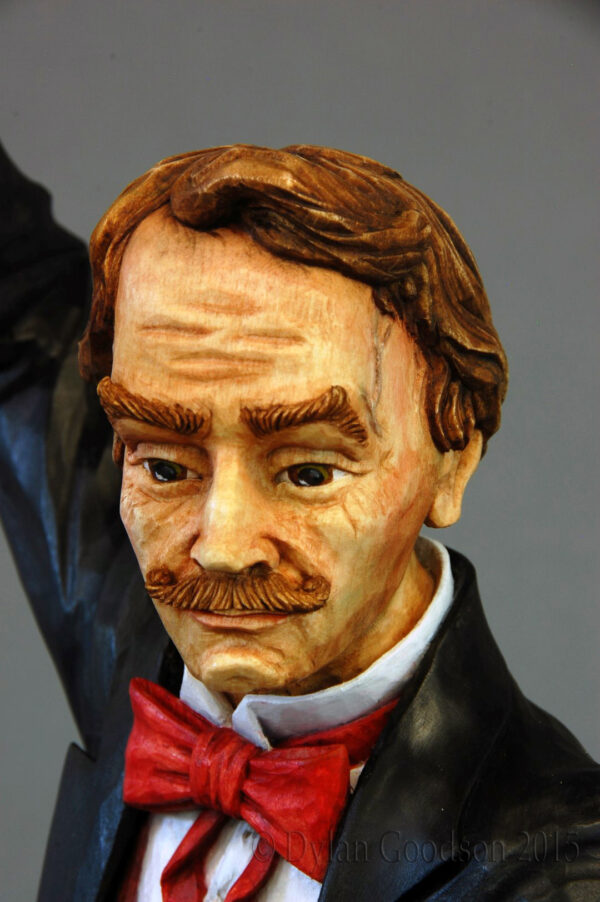 A close up of the face of Dylan Goodson's Magician woodcarving