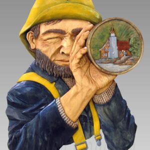 Relief carving of a fisherman or seafarer looking through a spyglass. Reflected in the spyglass lenses is a lighthouse