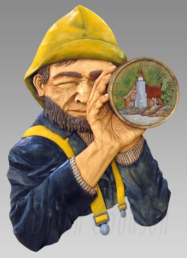Relief carving of a fisherman or seafarer looking through a spyglass. Reflected in the spyglass lenses is a lighthouse