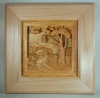 pictorial relief scene of a country landscape with a barn in the background