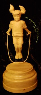 Girl jumping rope carved by dylan goodson