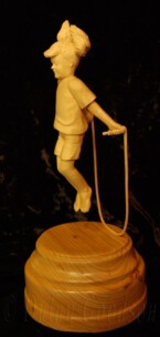 Girl jumping rope carved by dylan goodson
