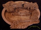 pictorial relief scene of the Mabry Mill, carved by dylan goodson