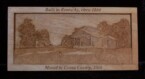 pictorial relief scene of a log cabin on top of a hill designed and carved by dylan goodson