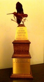 Trophy with a snipe on top.